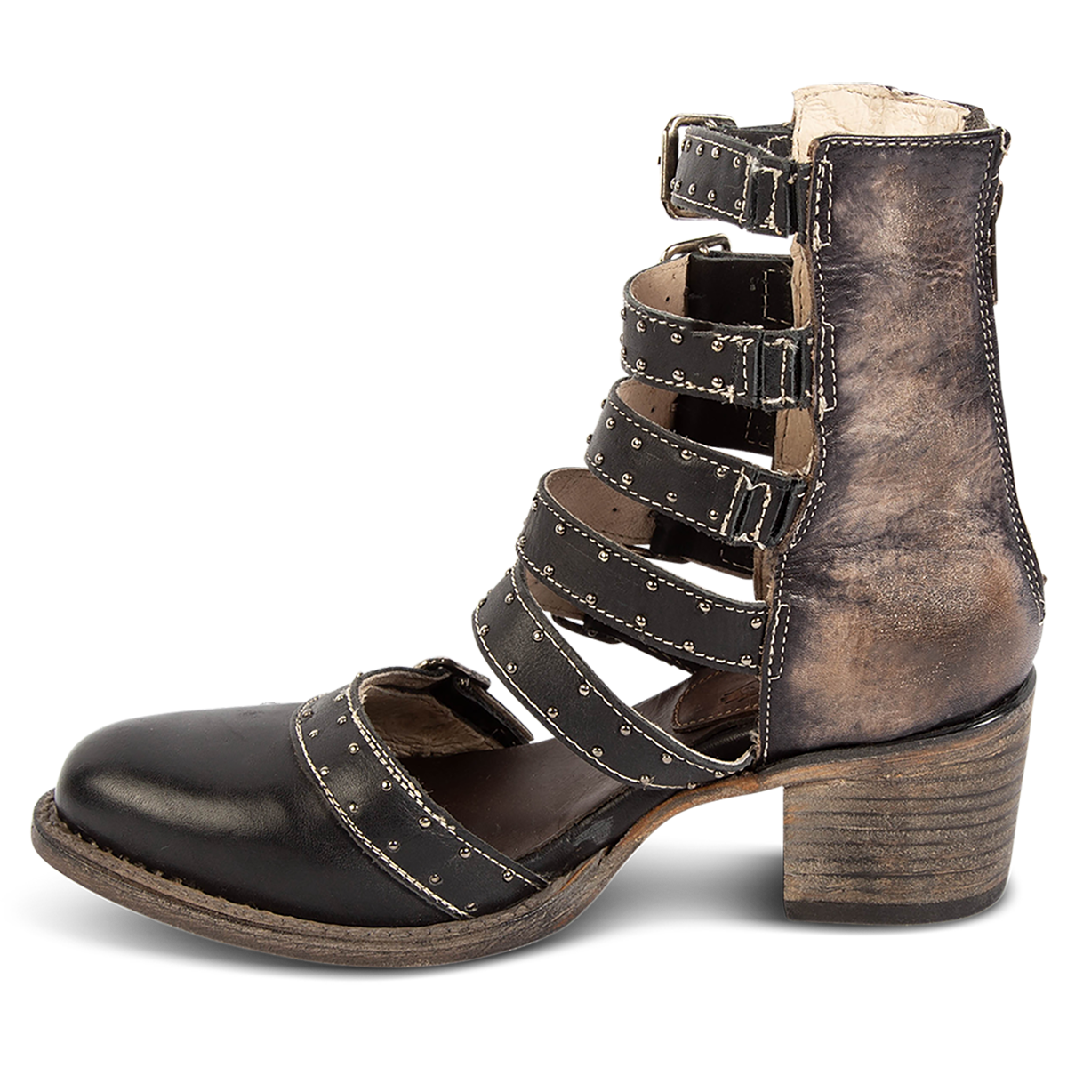 Inside view showing a stacked heel, adjustable leather straps and embellishments on FREEBIRD women's Salty black leather bootie