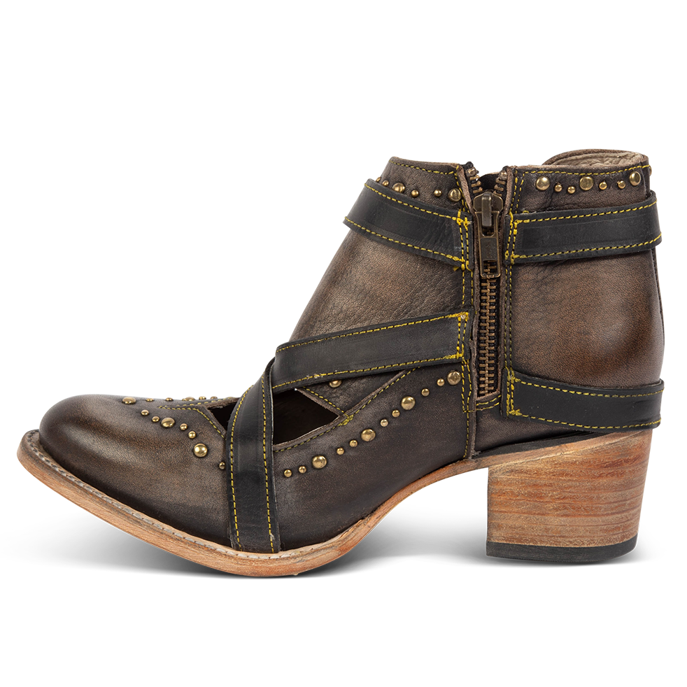 Side view showing low heel and working brass zip closure on FREEBIRD women's Samantha black bootie