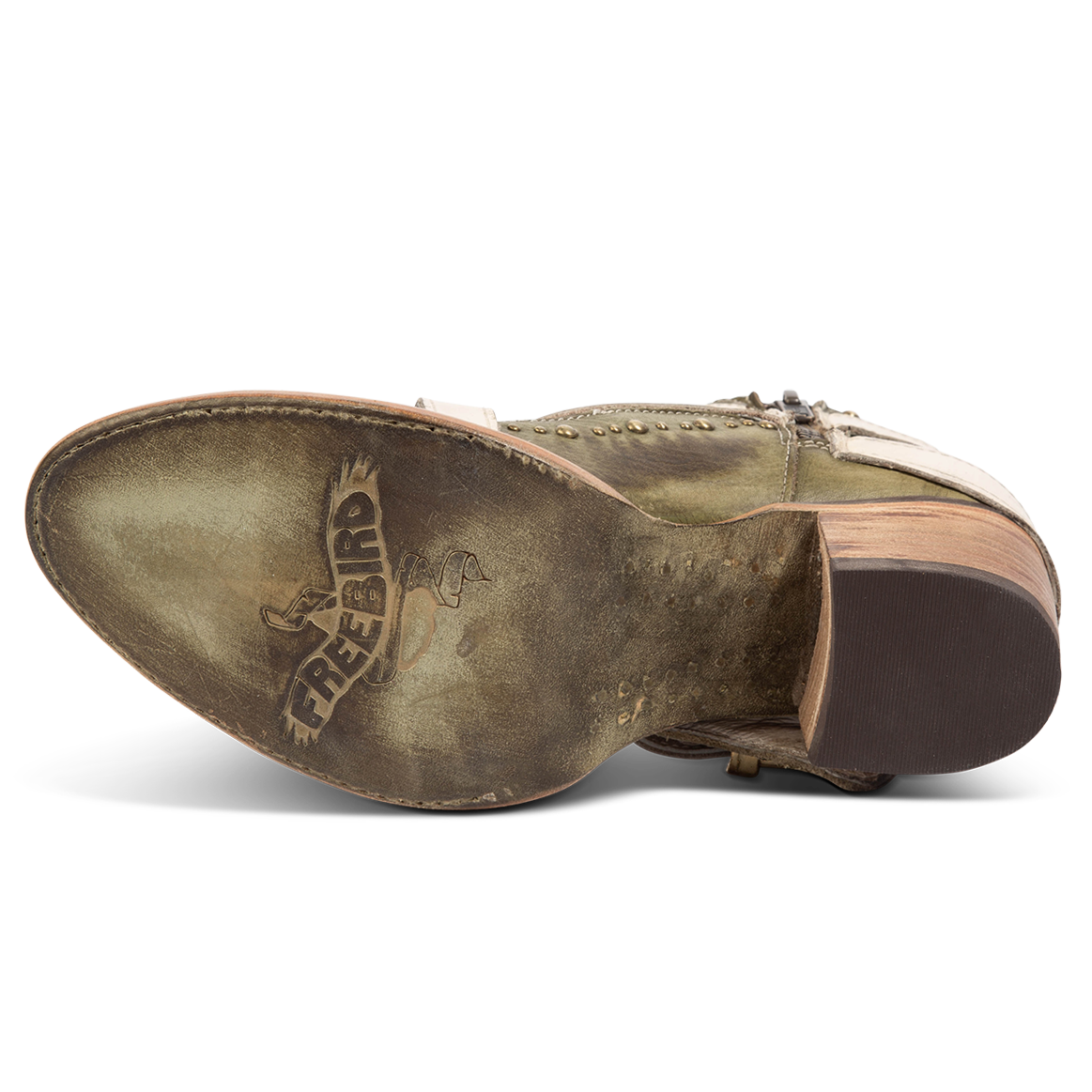 Leather sole imprinted with FREEBIRD on women's Samantha green low heeled bootie