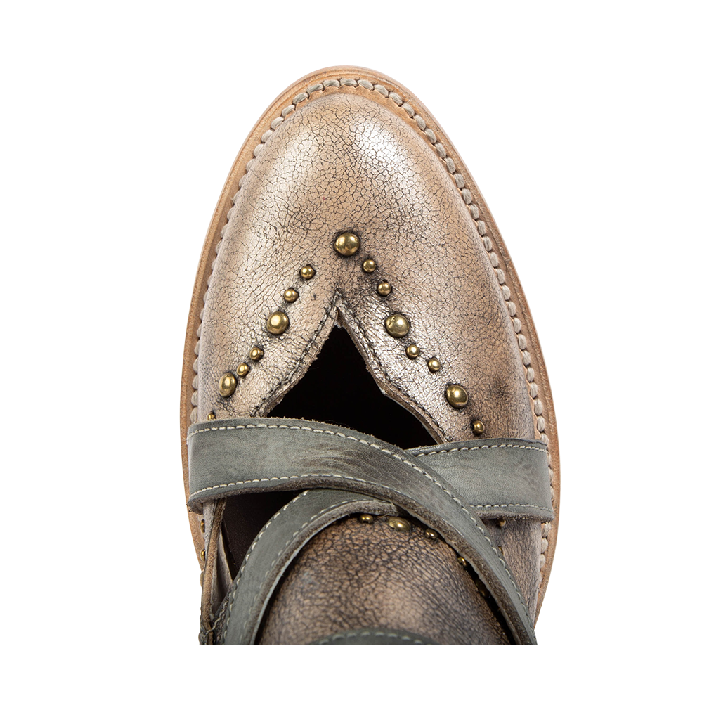 Top view showing almond toe construction with stud detailing and contrasting leather foot straps on FREEBIRD women's Samantha pewter bootie