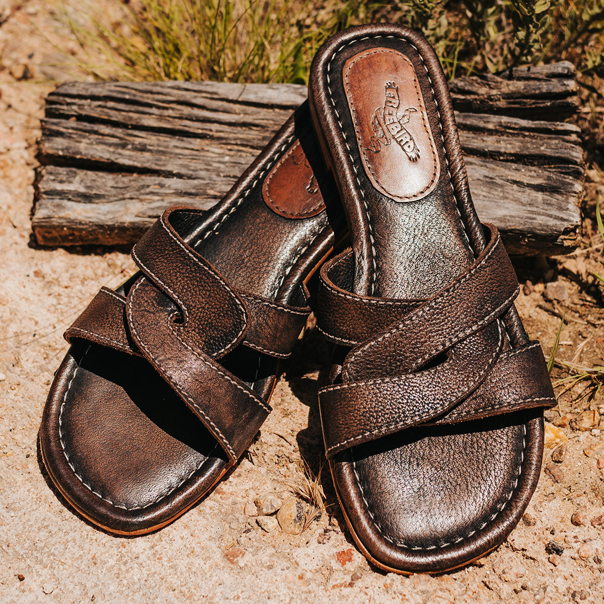 FREEBIRD women's Sawyer black low heeled slip on sandal featuring criss-cross leather foot straps