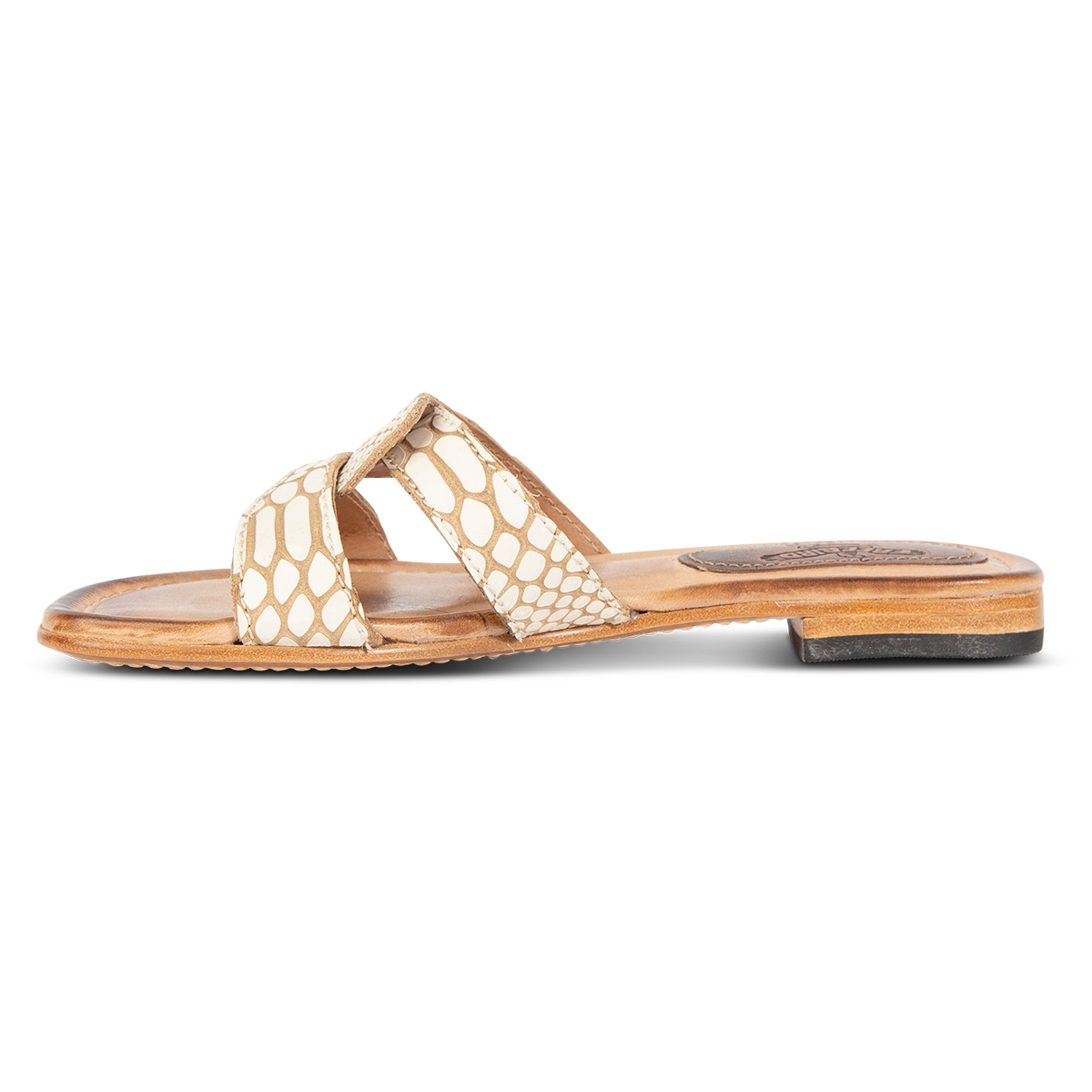 Inside view showing FREEBIRD criss-cross leather foot strap on women's Sawyer white snake low heeled sandal