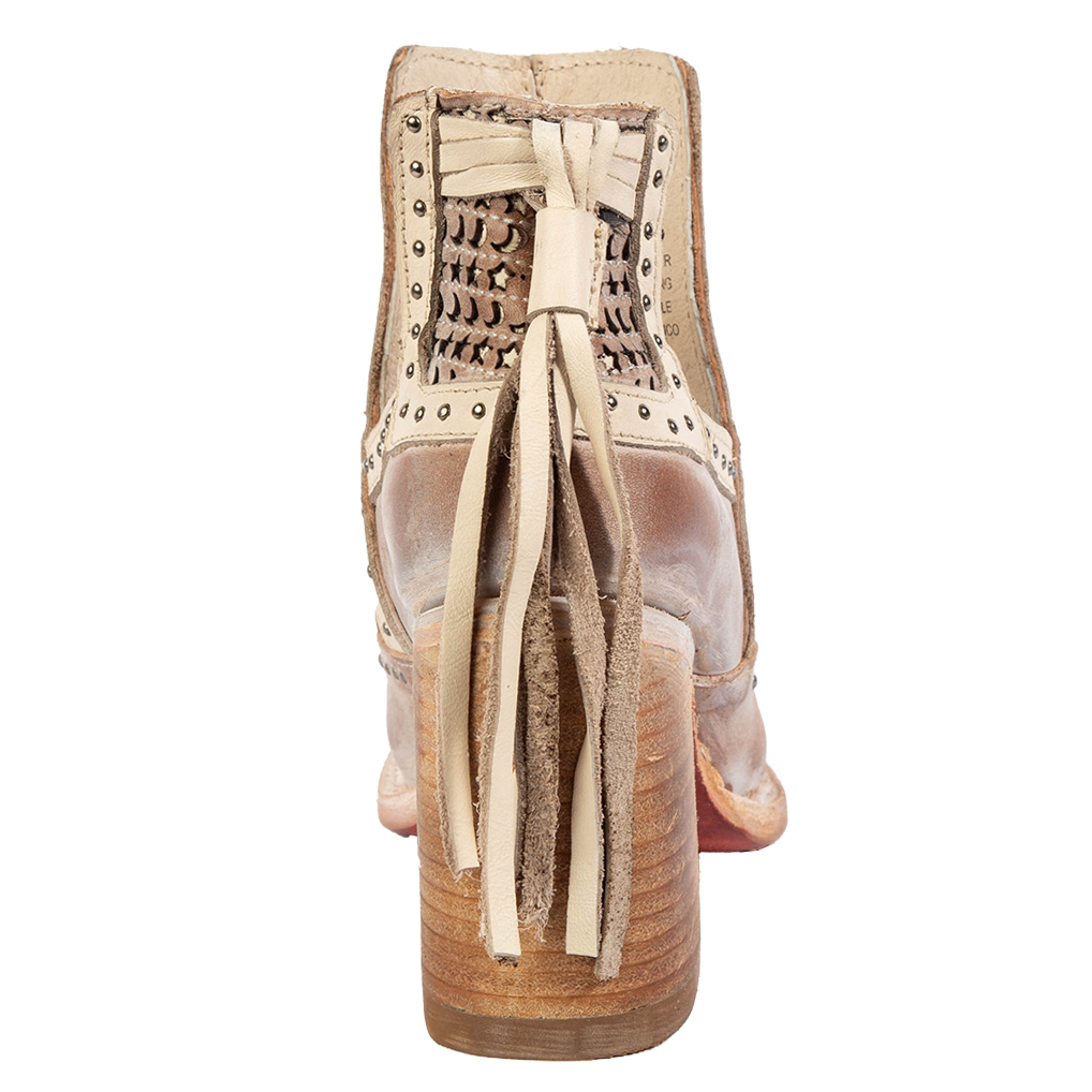 Back view showing wrapped heel and leather heel tassel detailing on FREEBIRD women's Sharona blush bootie