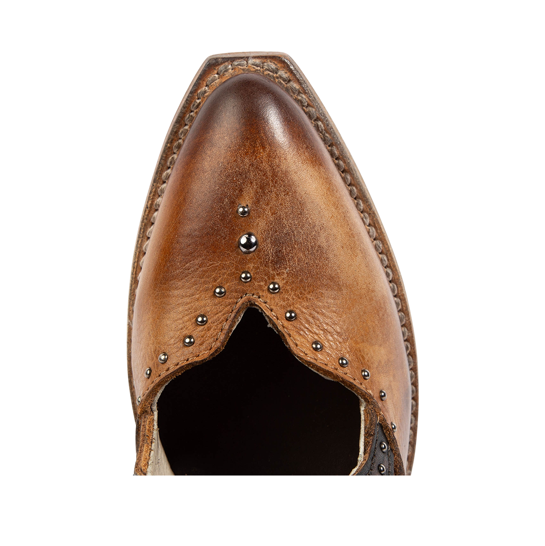 Top view showing silver stud detailing and pointed toe construction on FREEBIRD women's Sharona tan bootie