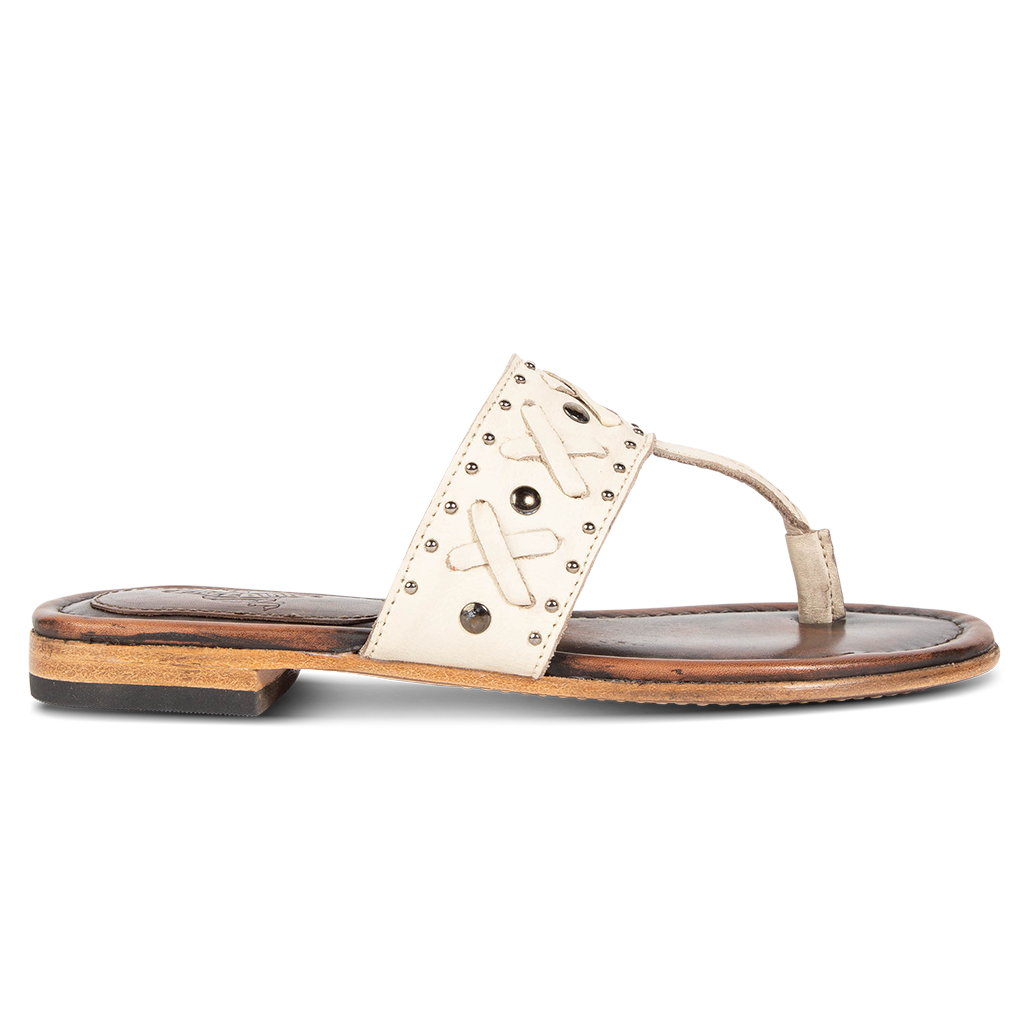 FREEBIRD women's Shay beige low heeled slip on sandal featuring woven leather foot strap with stud embellishments