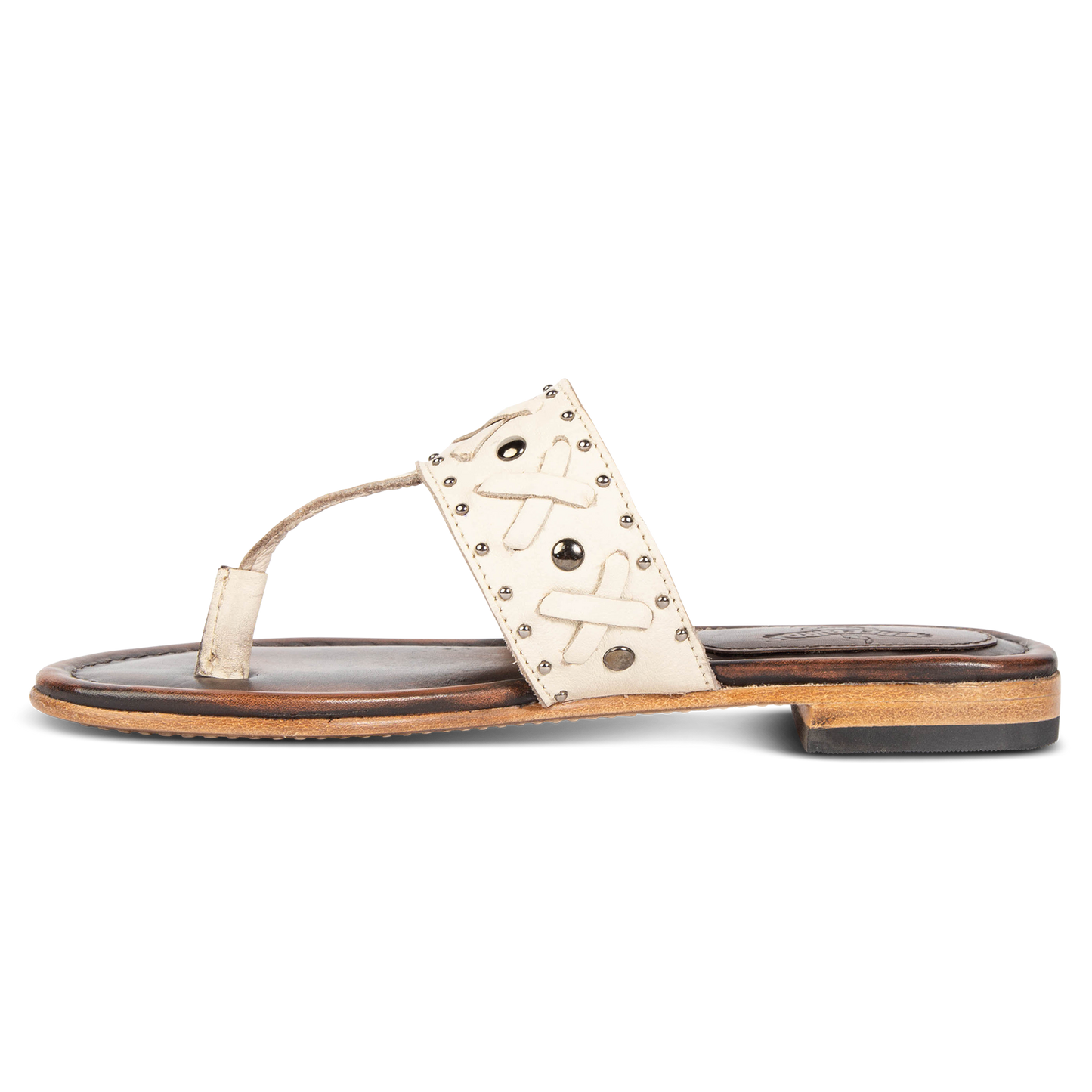 Inside view showing woven leather embellished foot strap FREEBIRD on women's Shay beige low heeled sandal