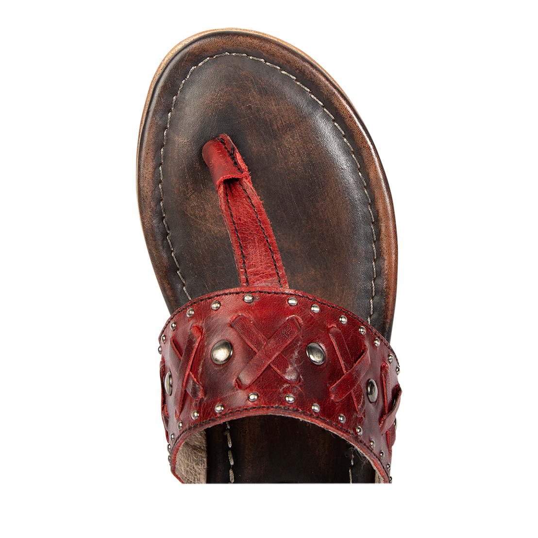 Top view showing woven leather embellished foot strap on FREEBIRD women's Shay red low heeled sandal