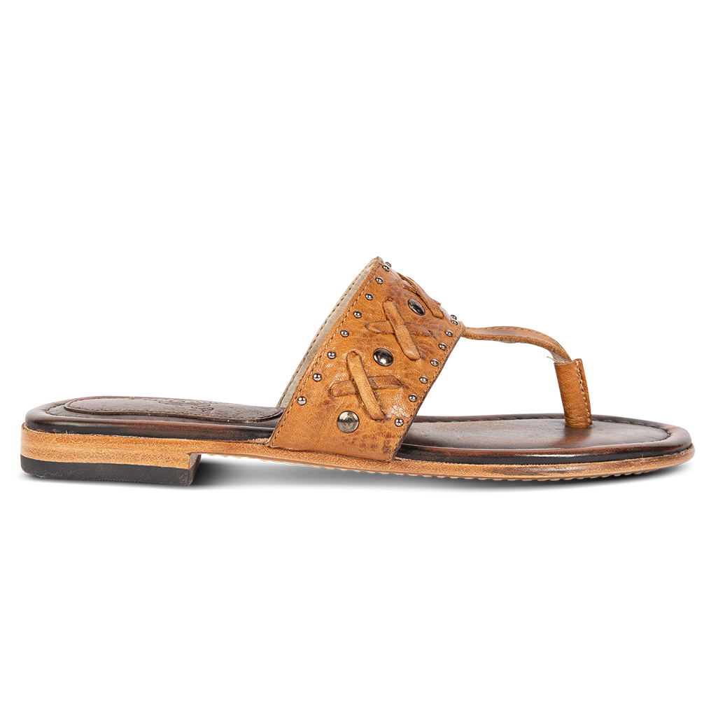 FREEBIRD women's Shay wheat low heeled slip on sandal featuring woven leather foot strap with stud embellishments