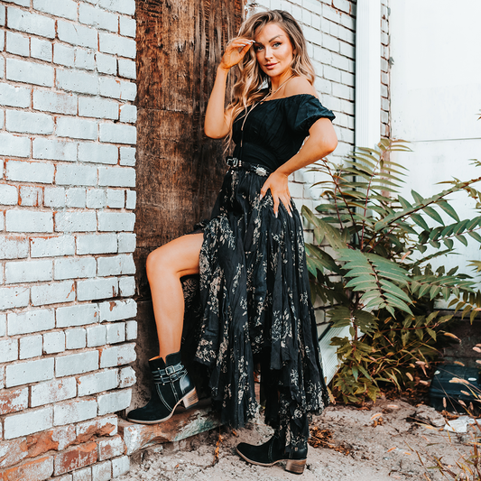 FREEBIRD women's Shiloh black suede leather ankle bootie with inside zip closure and two buckle straps lifestyle