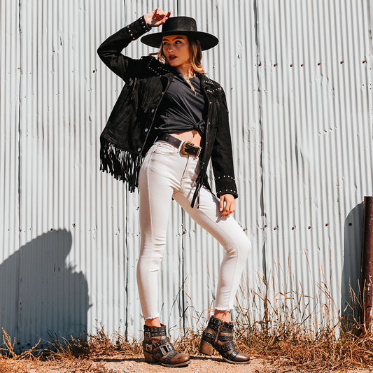 FREEBIRD women's Slayer black leather ankle bootie with inside zip closure and embellished buckle straps lifestyle