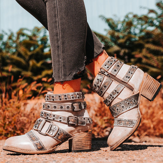 FREEBIRD women's Slayer Ice-Multi leather ankle bootie with inside zip closure and embellished buckle straps