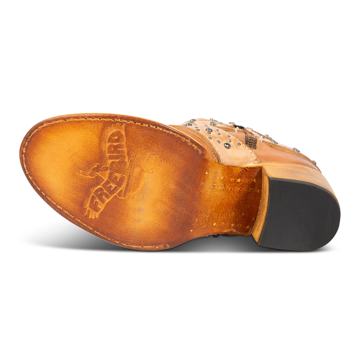 Leather sole imprinted with FREEBIRD on women's Slayer tan multi leather ankle bootie