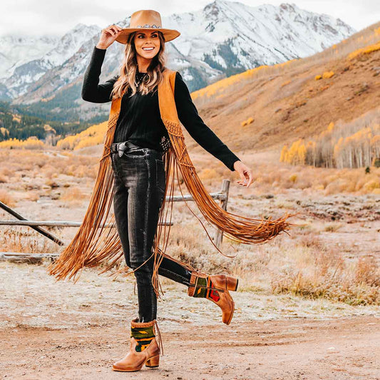 FREEBIRD women's Songbird tan leather bootie with woven detailing, leather tie lacing and an inside working brass zip closure lifestyle