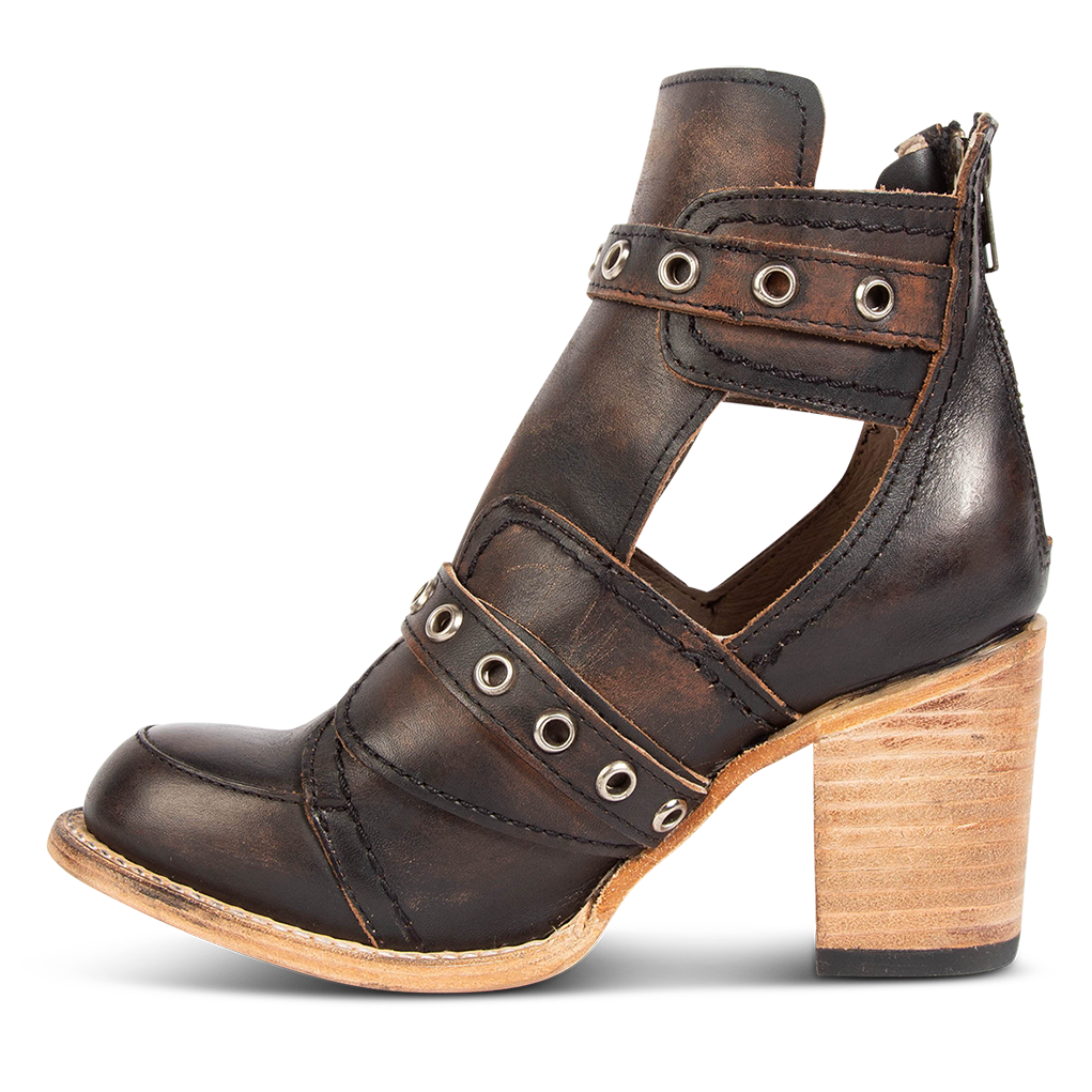 Inside view showing ankle cut-out and embellished leather straps with silver hardware on FREEBIRD women's Sonoma black distressed leather bootie
