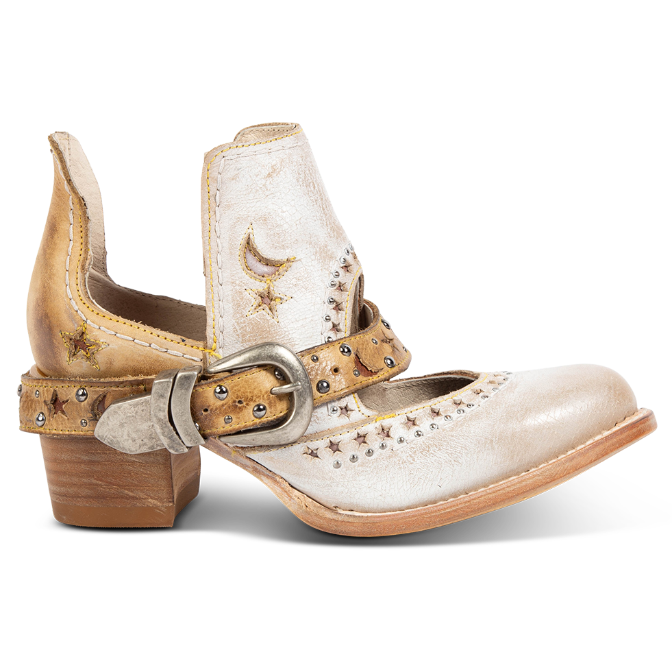FREEBIRD women's Stardom beige bootie with silver stud detailing, laser cut leather, open ankles, and a decorative ankle strap