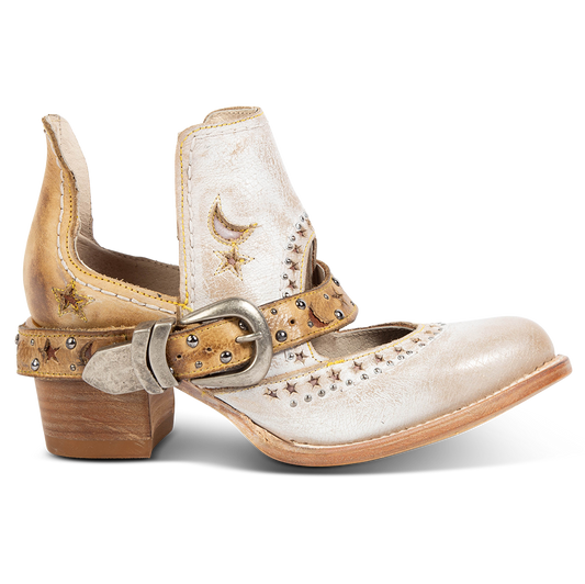 FREEBIRD women's Stardom beige bootie with silver stud detailing, laser cut leather, open ankles, and a decorative ankle strap