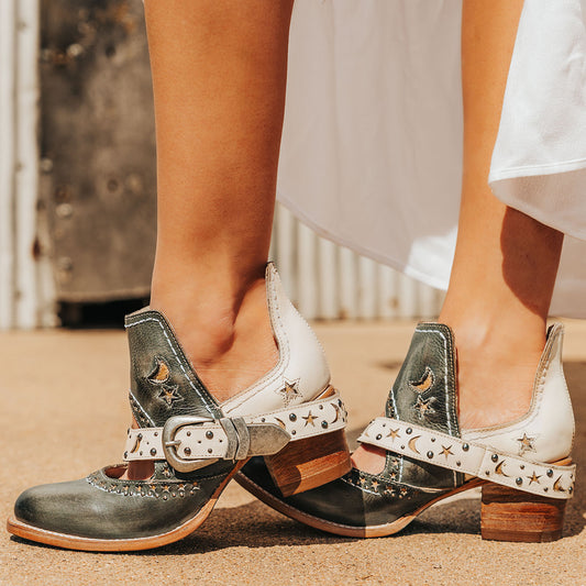 FREEBIRD women's Stardom blue bootie with silver stud detailing, laser cut leather, open ankles, and a decorative ankle strap