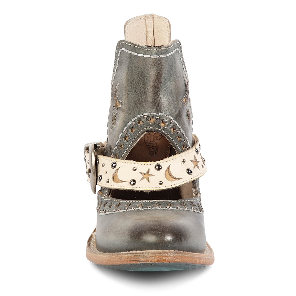 Front view showing laser cut leather detailing, instep cutout, and ankle strap with stars/moons on FREEBIRD women's Stardom blue bootie