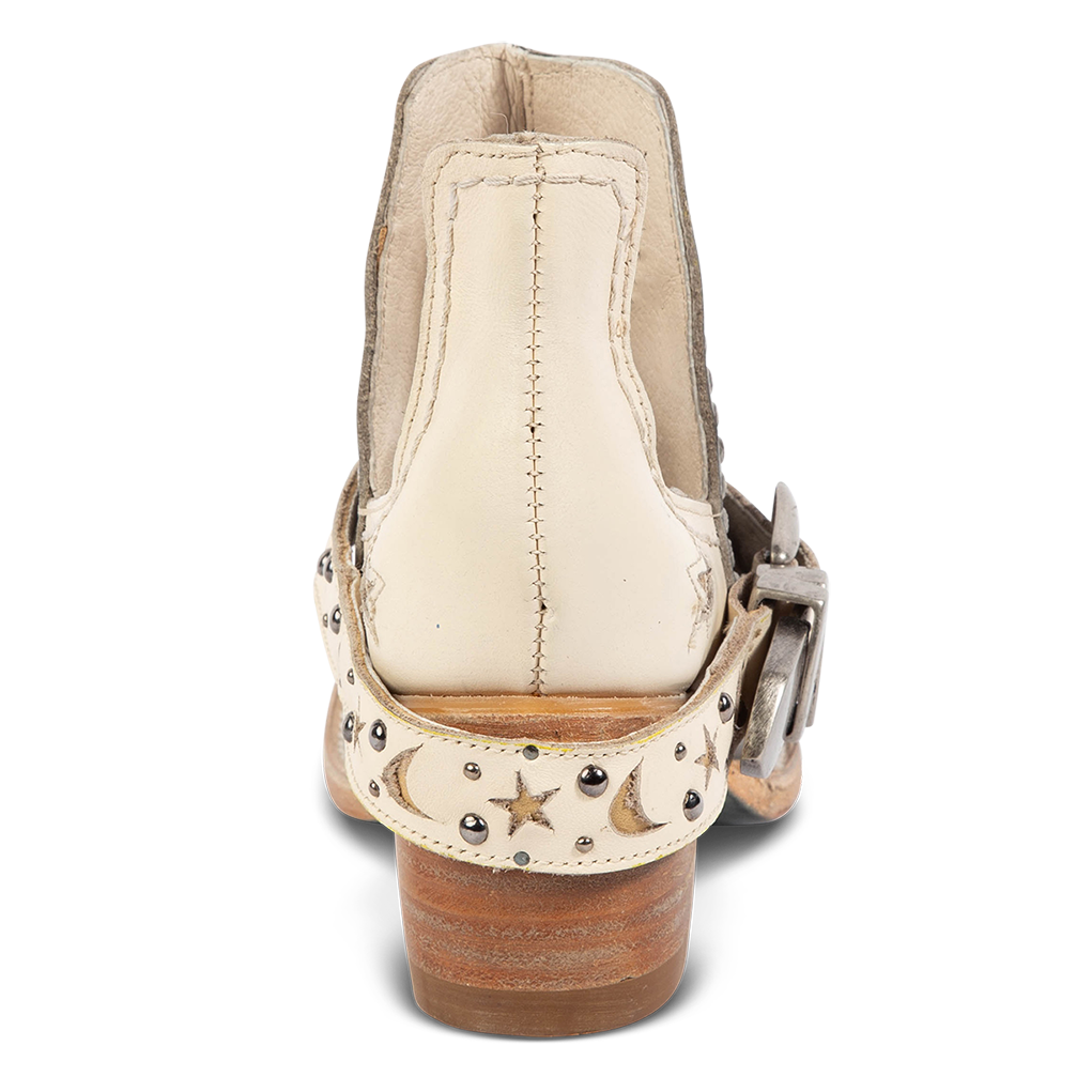 Back view showing a low stacked heel and decorative ankle strap on FREEBIRD women's Stardom blue bootie