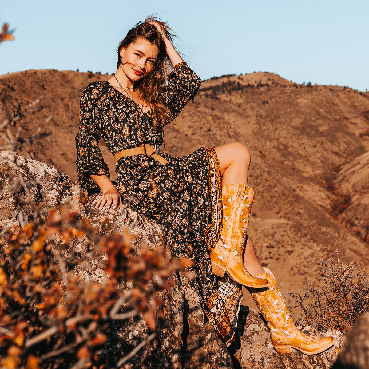 FREEBIRD women's Starzz banana leather cowboy boot with two-toned leather star inlay detailing traditional stitching and snip toe construction lifestyle 