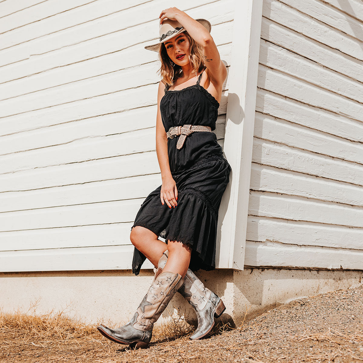 FREEBIRD women's Starzz beige leather cowboy boot with two-toned leather star inlay detailing traditional stitching and snip toe construction lifestyle image