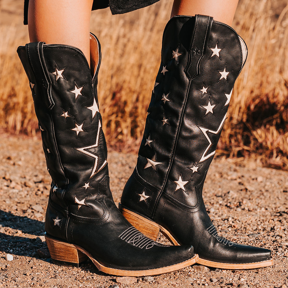FREEBIRD women's Starzz back multi leather cowboy boot with two-toned leather star inlay detailing traditional stitching and snip toe construction