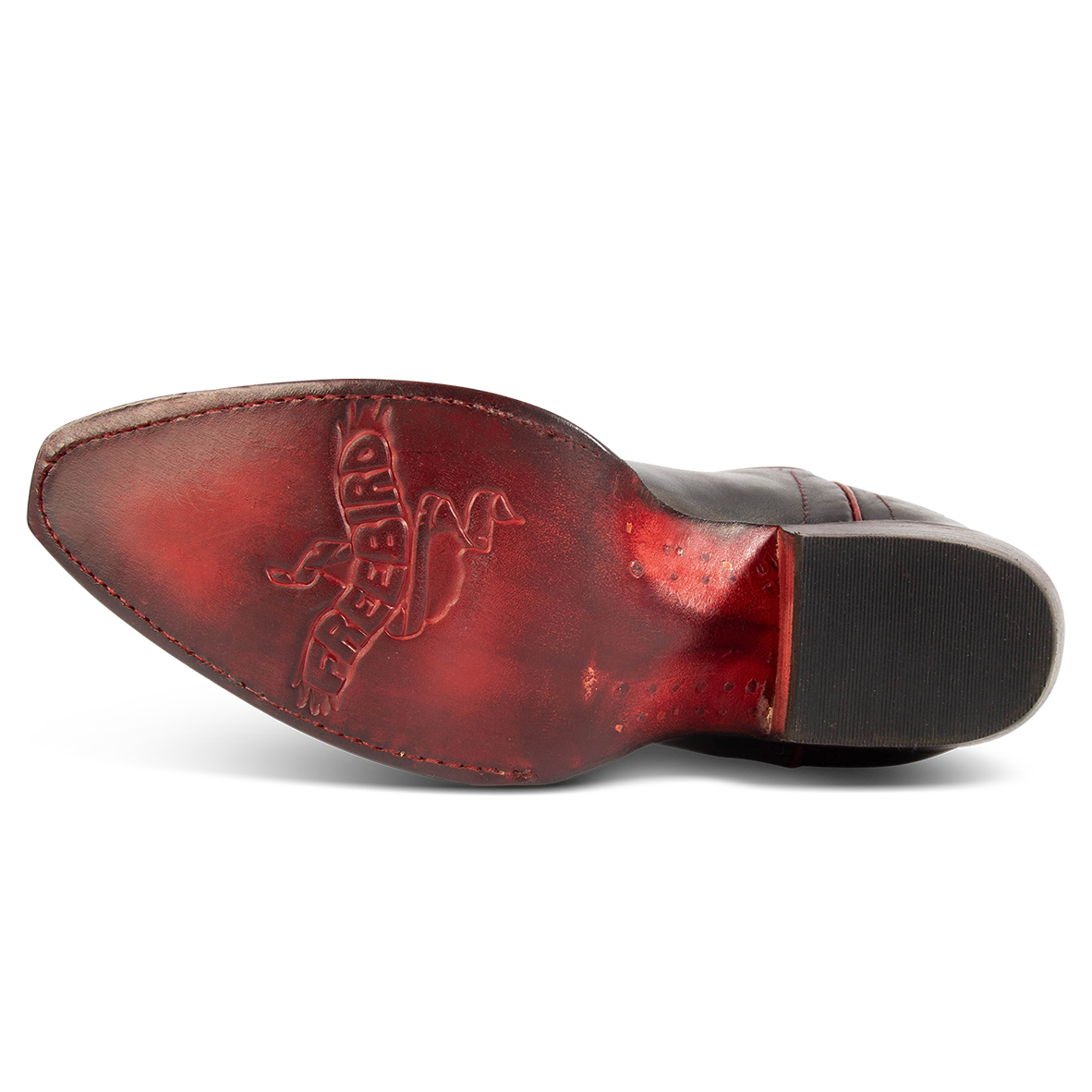 Red leather sole imprinted with FREEBIRD on women's Starzz red western boot