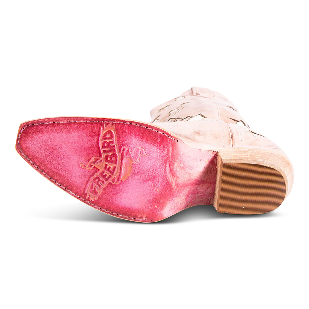 Leather sole imprinted with FREEBIRD on women's Starzz blush western boot
