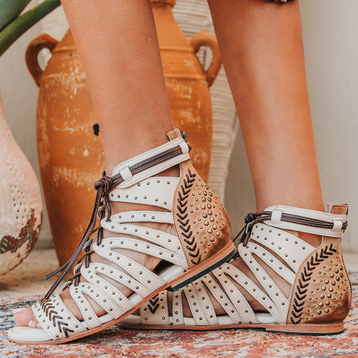 FREEBIRD STORES women's Swan beige leather sandal with two toned leather, stud detailing and a leather lace front closure 