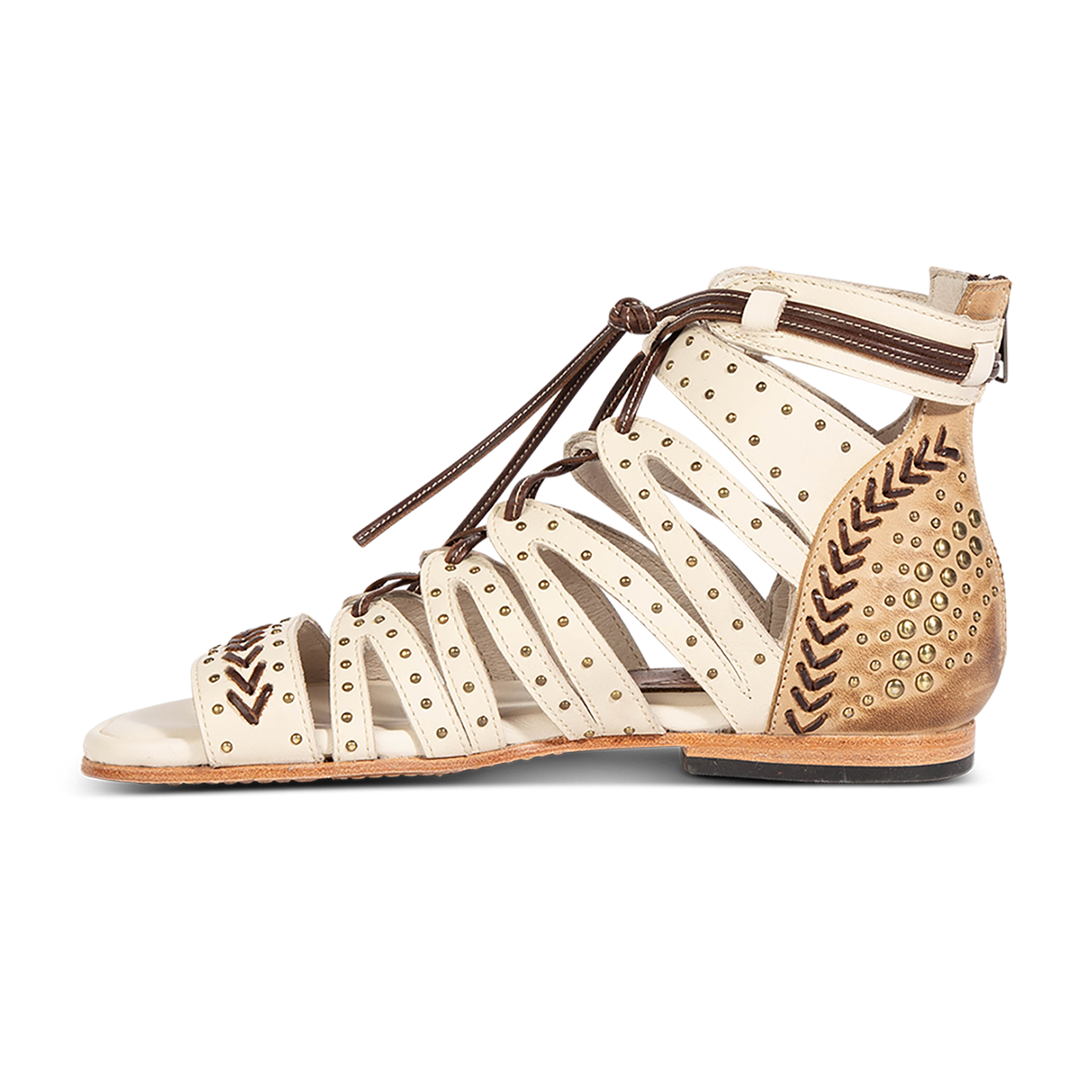 Inside view showing FREEBIRD STORES women's Swan beige leather sandal with two toned leather, stud detailing and a leather lace front closure 