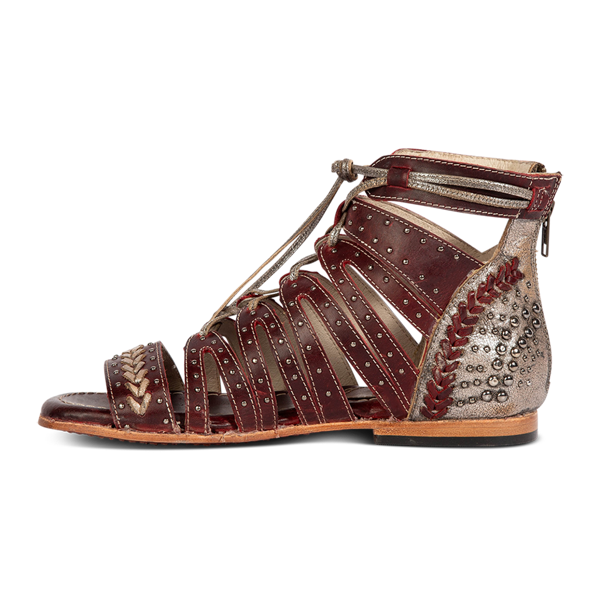 Inside view showing FREEBIRD STORES women's Swan red leather sandal with two toned leather, stud detailing and a leather lace front closure 