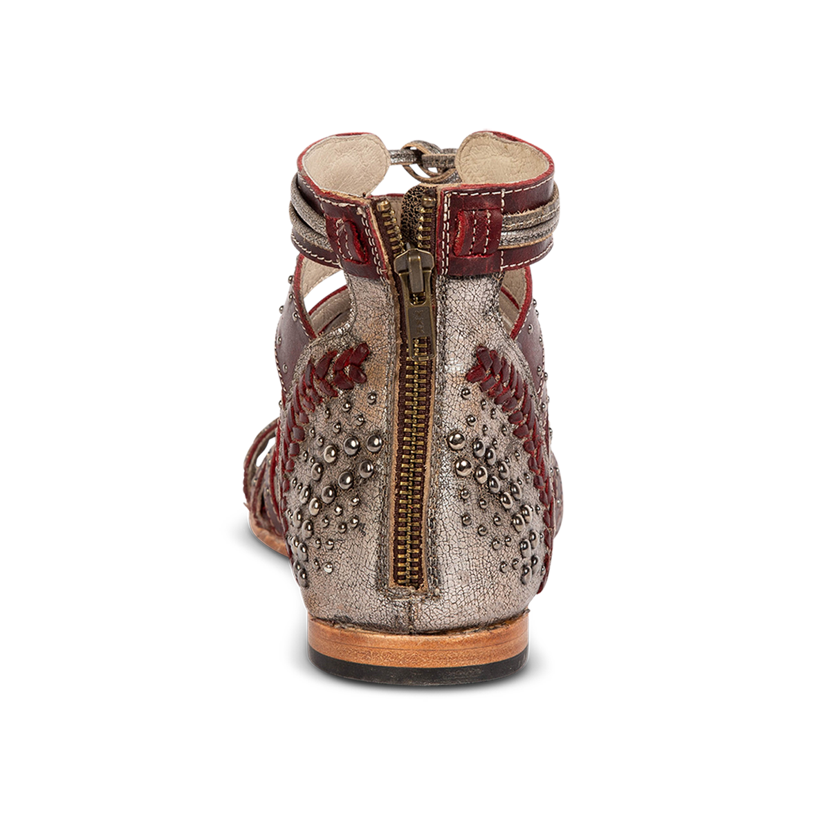 Back view showing FREEBIRD STORES women's Swan red leather sandal with two toned leather, stud detailing and a brass zipper closure