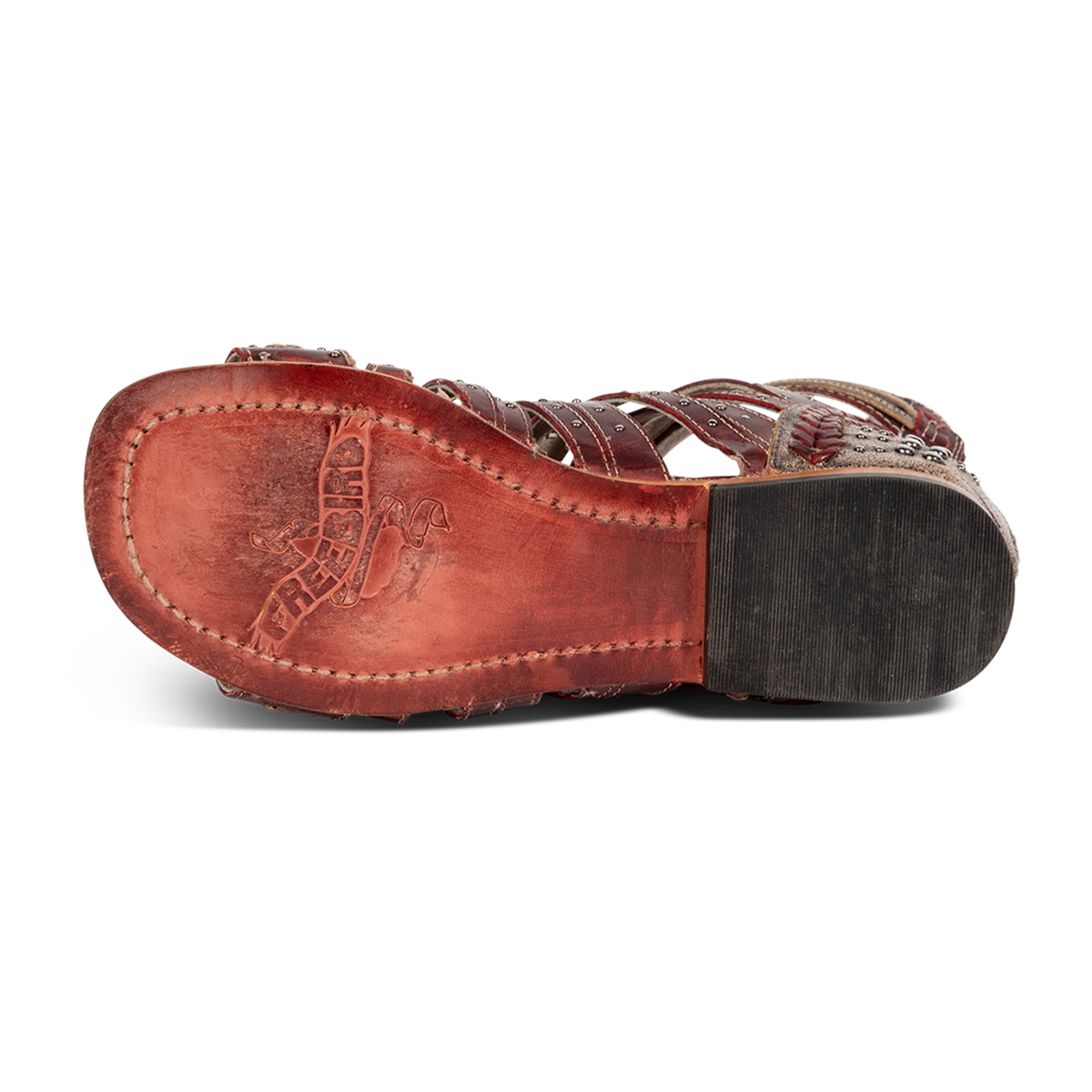 Leather sole imprinted with FREEBIRD on women's Swan red leather sandal