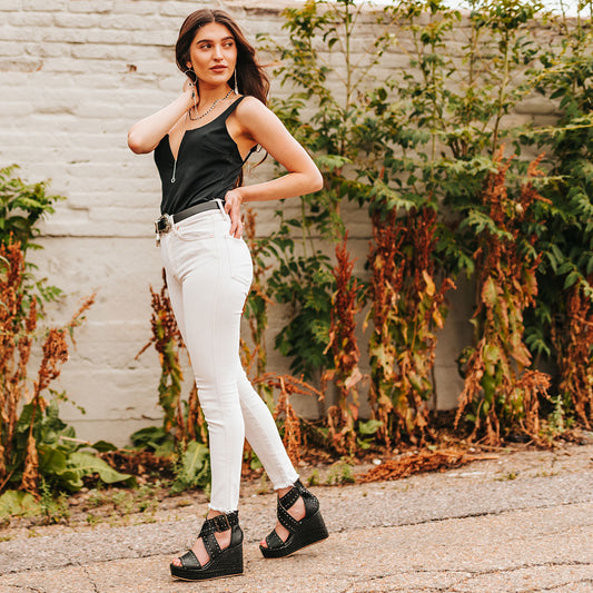 FREEBIRD women's Terra black snake platform sandal with wedge heel, an adjustable ankle strap, and stud detailing lifestyle