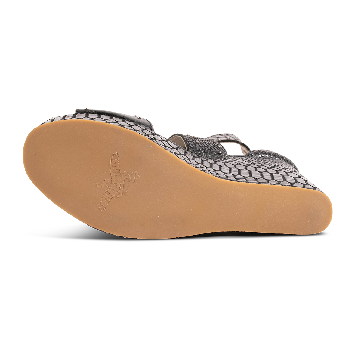Rubber sole imprinted with FREEBIRD on women's Terra black snake platform sandal with stud detailing