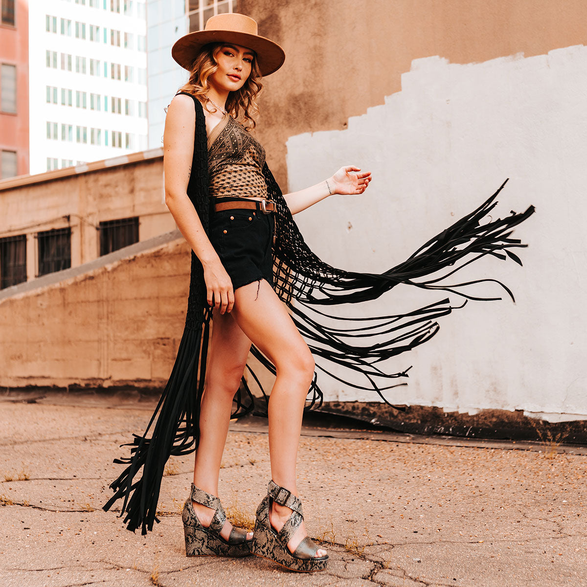 FREEBIRD women's Terra olive snake multi platform sandal with wedge heel, an adjustable ankle strap, and stud detailing lifestyle