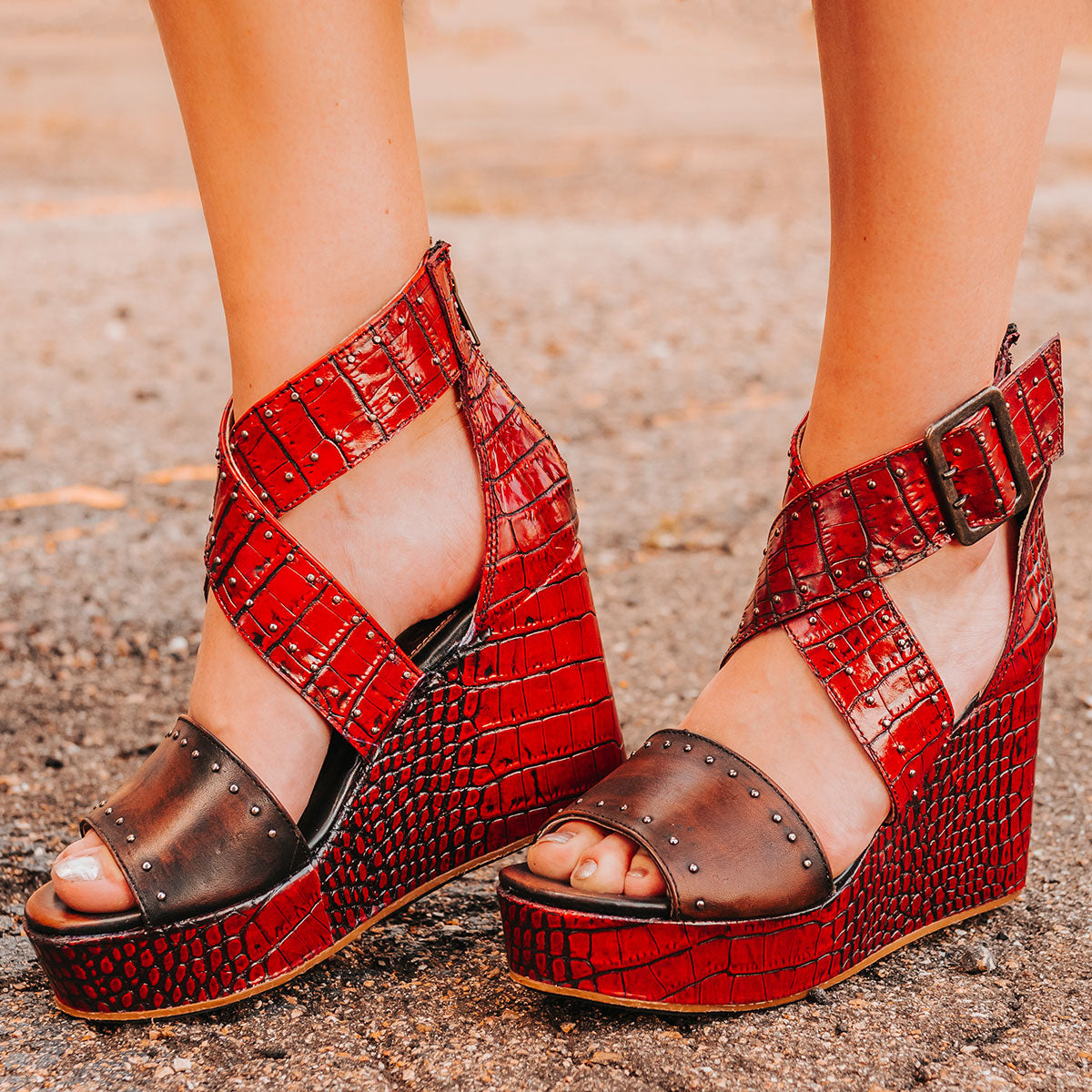 FREEBIRD women's Terra red croco multi platform sandal with wedge heel, an adjustable ankle strap, and stud detailing