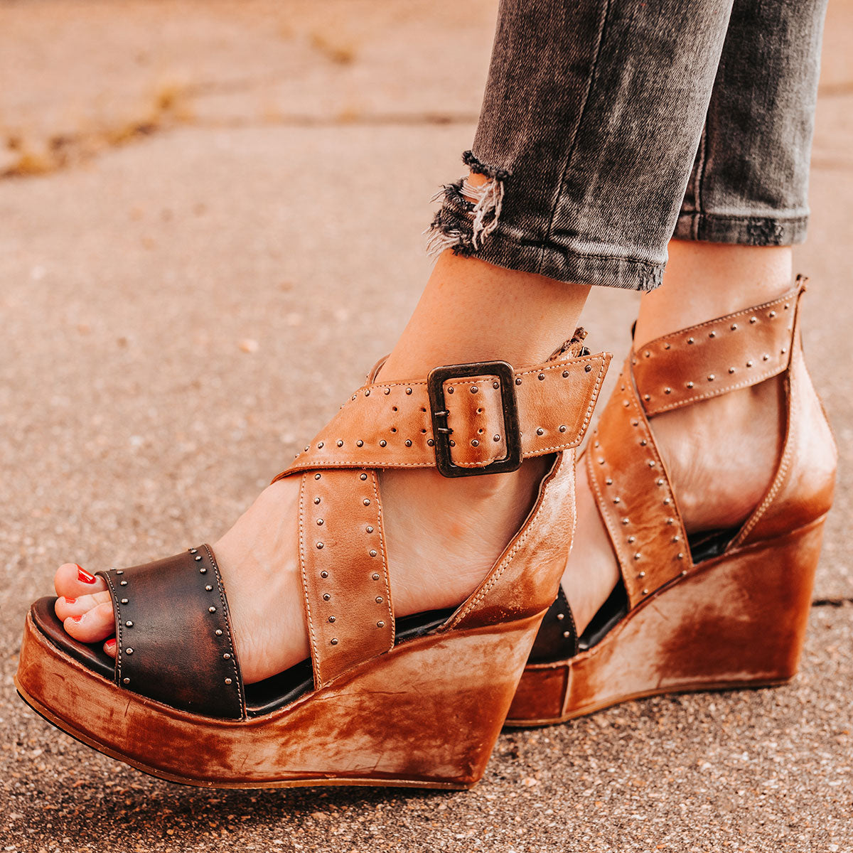 FREEBIRD women's Terra taupe multi platform sandal with wedge heel, an adjustable ankle strap, and stud detailing