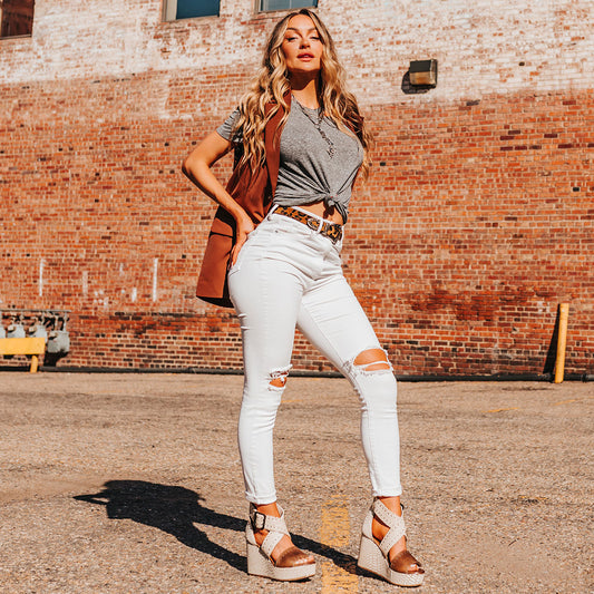 FREEBIRD women's Terra white snake multi platform sandal with wedge heel, an adjustable ankle strap, and stud detailing lifestyle