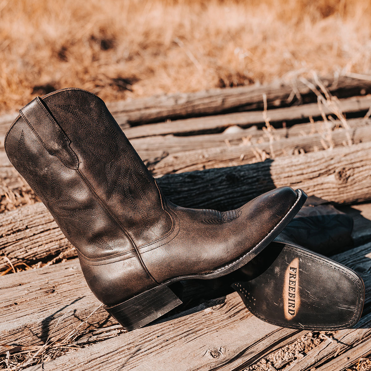 FREEBIRD men's Union black leather boot with leather pull straps, traditional stitching and square toe construction