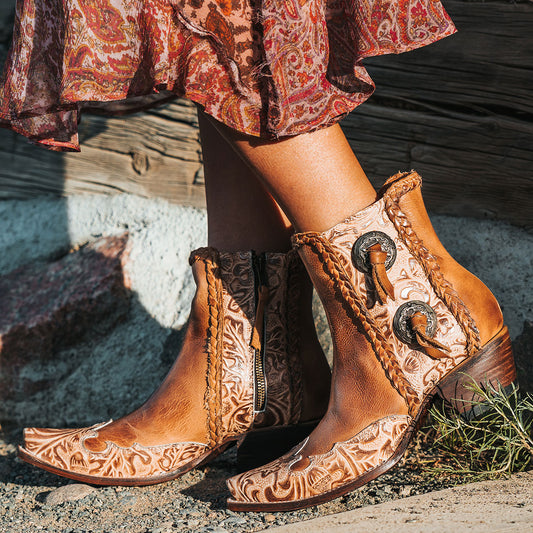 FREEBIRD women's WAGON honey tooled leather western bootie featuring a snip toe, tooled leather, and medium heel 