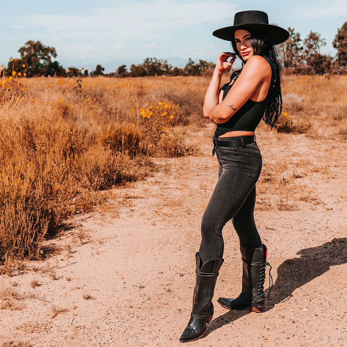 FREEBIRD women's Wardon black snake leather cowboy boot with back lace panel and snip toe construction lifestyle