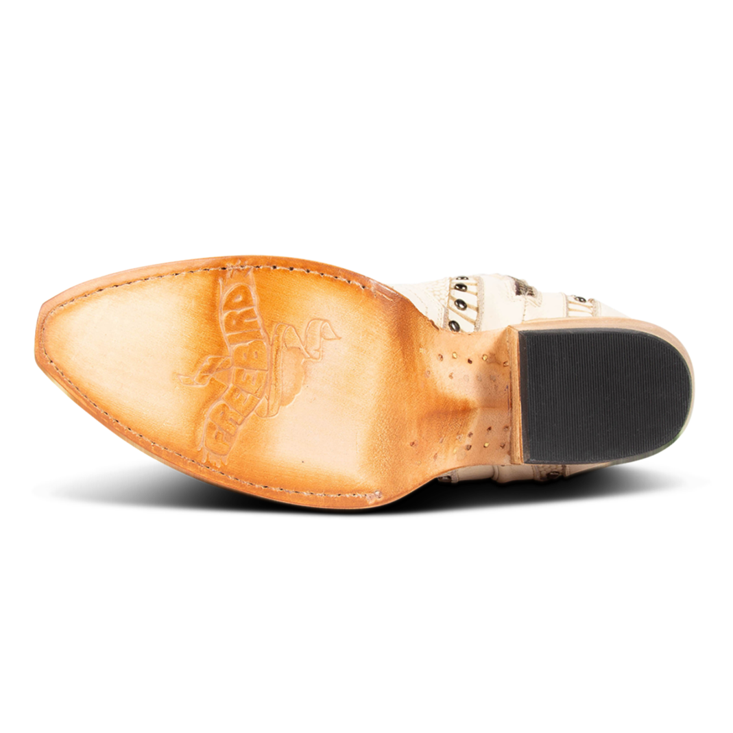 Leather sole imprinted with FREEBIRD on women's Warner beige leather western cowboy boot