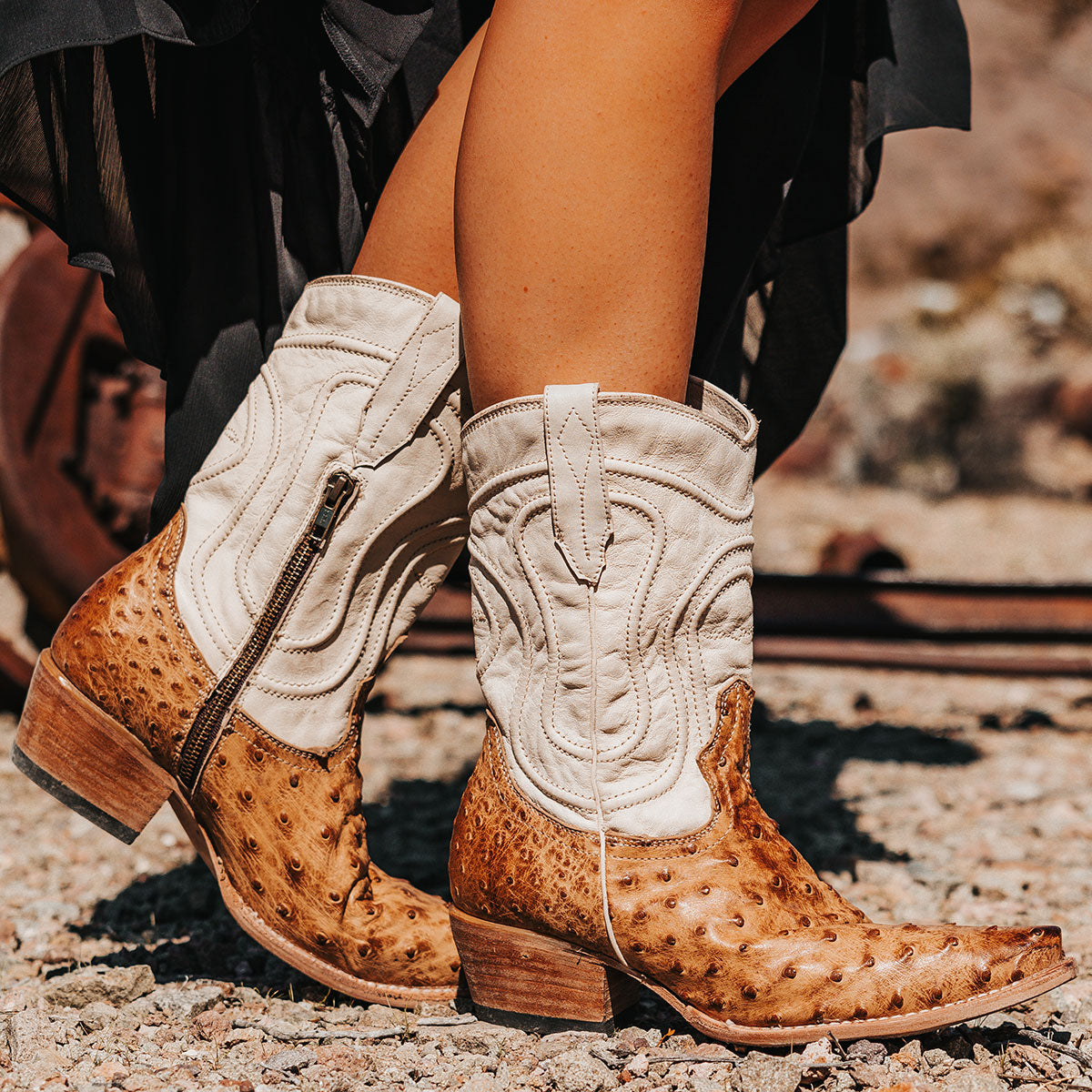 WARRICK tan ostrich multi-leather western boots with decorative embroidery, double pull straps, and side zipper.