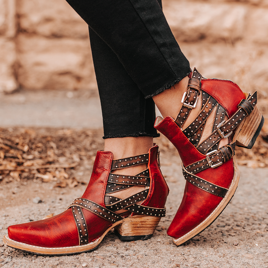 FREEBIRD women's Wasp red ankle bootie with exposed sides, adjustable fastener metal buckles, working back zip closure, snip toe, and traditional snip toe