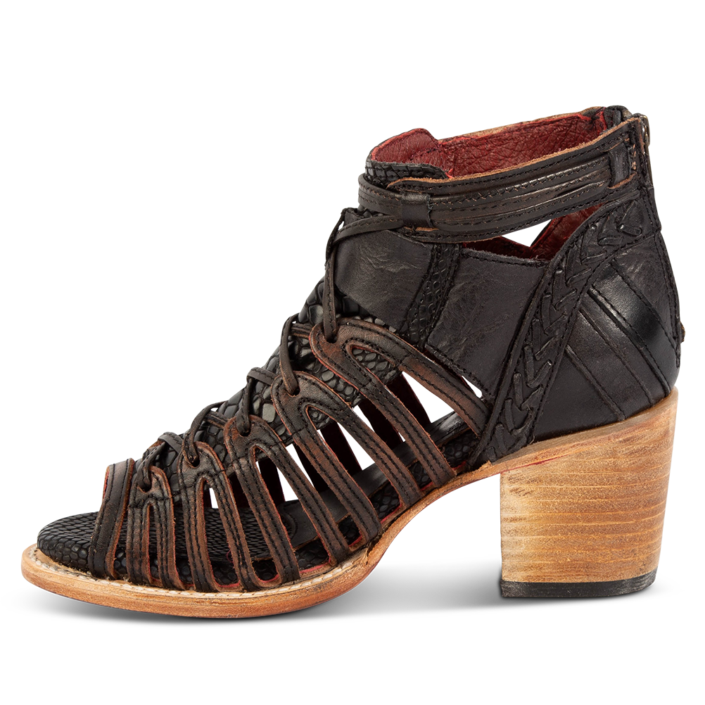 Inside view exposed sides and criss-cross lacing detailing FREEBIRD women's Wazee black sandal