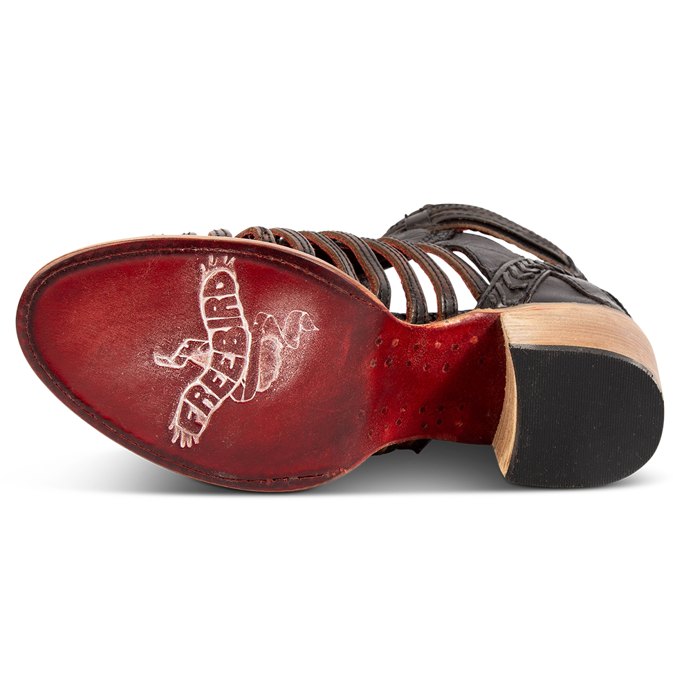 Leather sole imprinted with FREEBIRD on women's Wazee black sandal