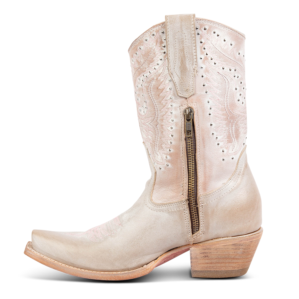 Side view showing leather pull tabs and working brass half zip closure on FREEBIRD women's Westrose blush boot