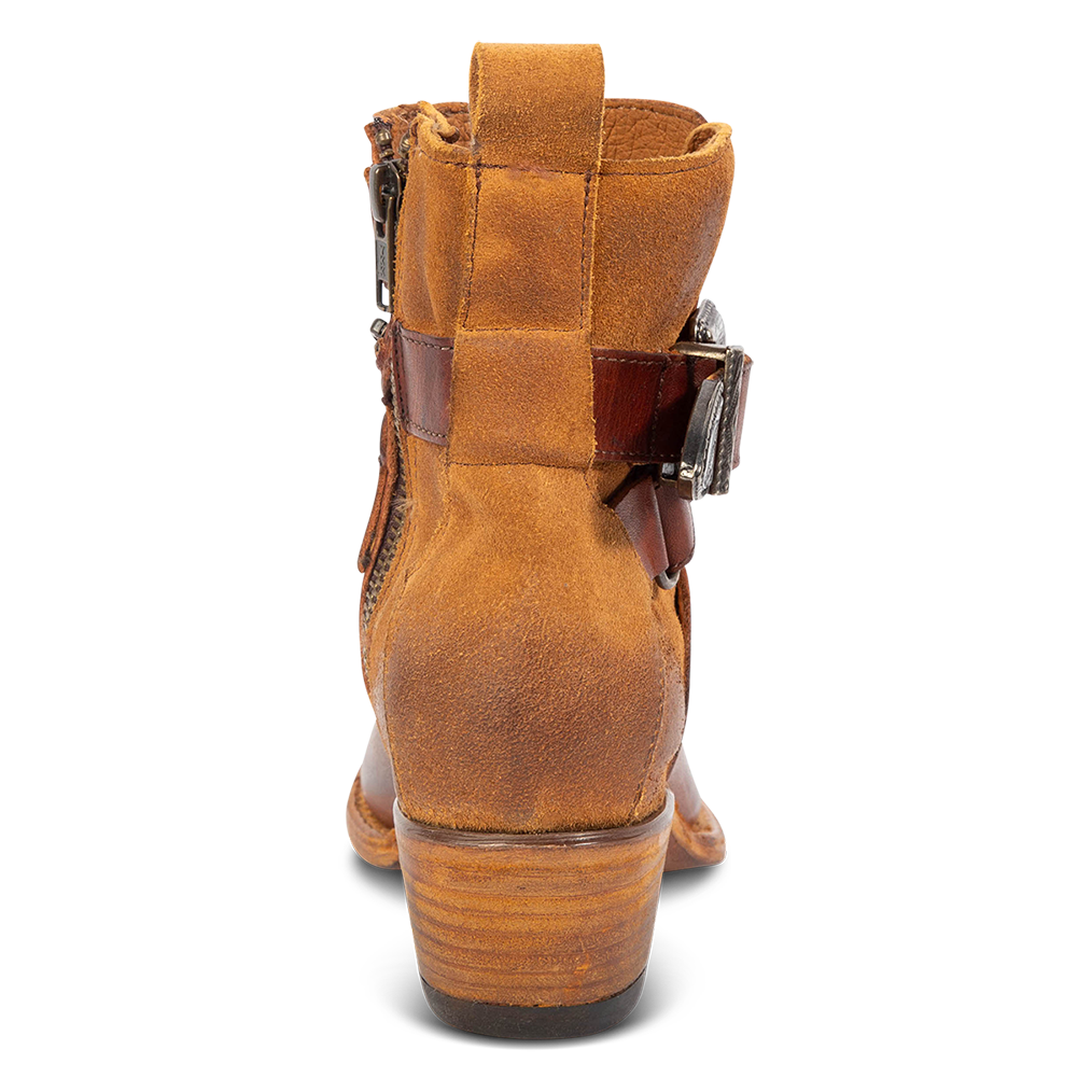 Back view showing low heel and pull strap on FREEBIRD women's Whip cognac leather western ankle bootie