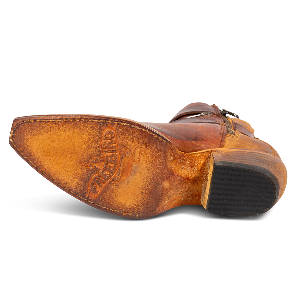 Leather sole imprinted with FREEBIRD on women's Whip cognac leather ankle bootie